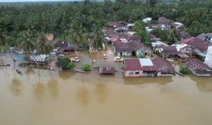 Penampakan-dari-udara-kondisi-banjir-akibat-luapan-Sungai-Kampar